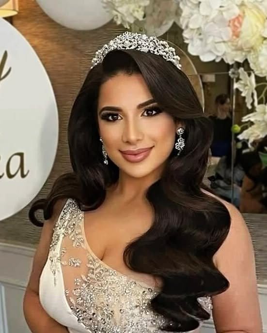 Wavy hairstyle with jeweled headpiece
