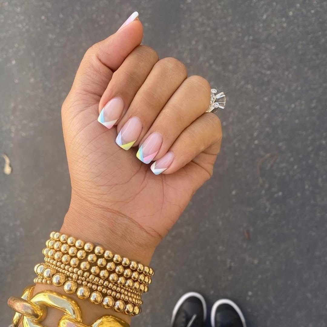 Geometric French tip nails in angular shapes