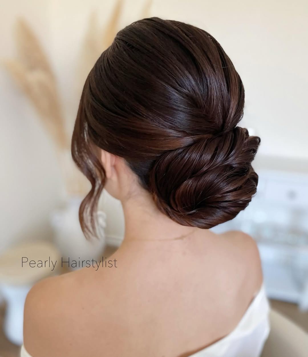 Elegant high bun with decorative comb