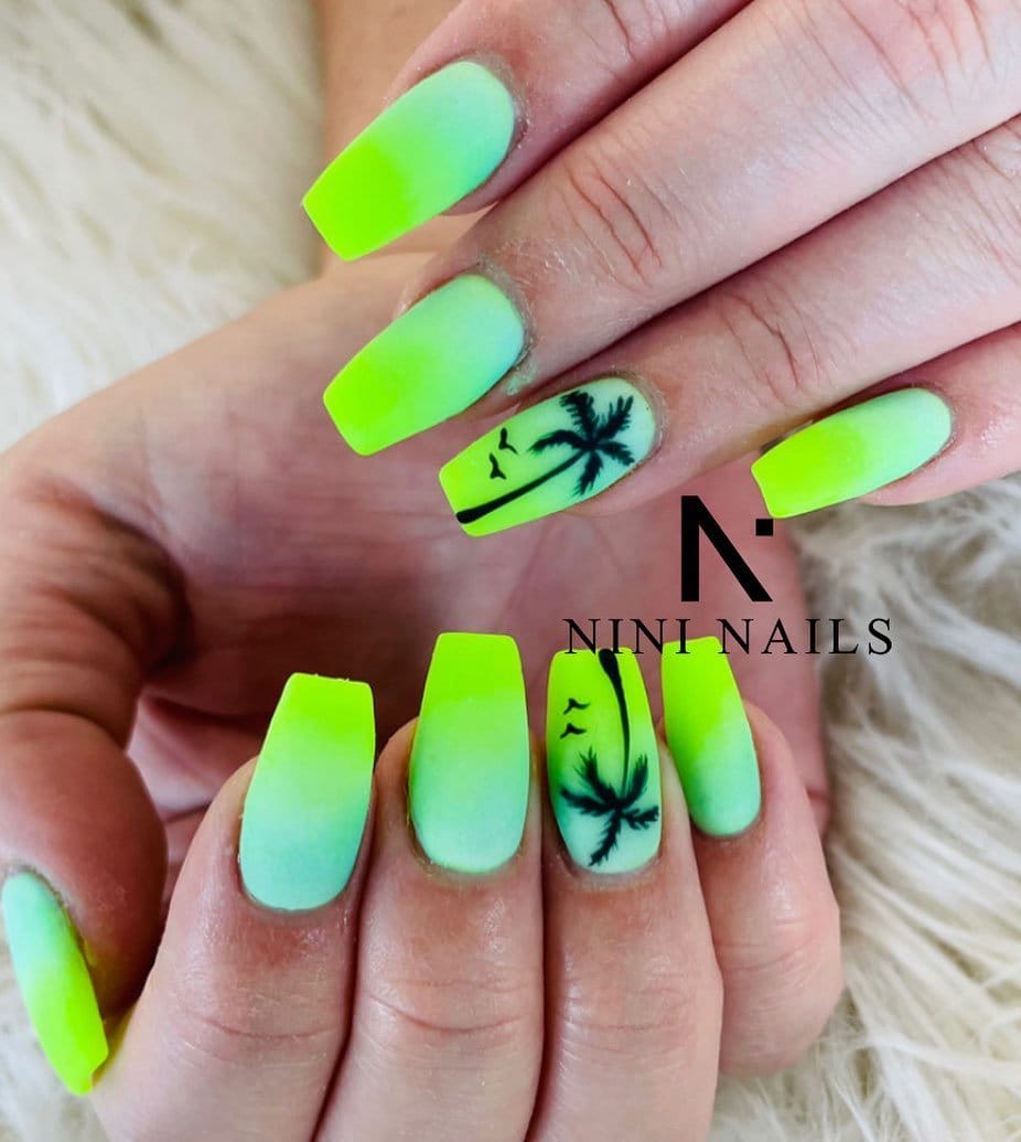 Yellow nails with palm tree silhouettes