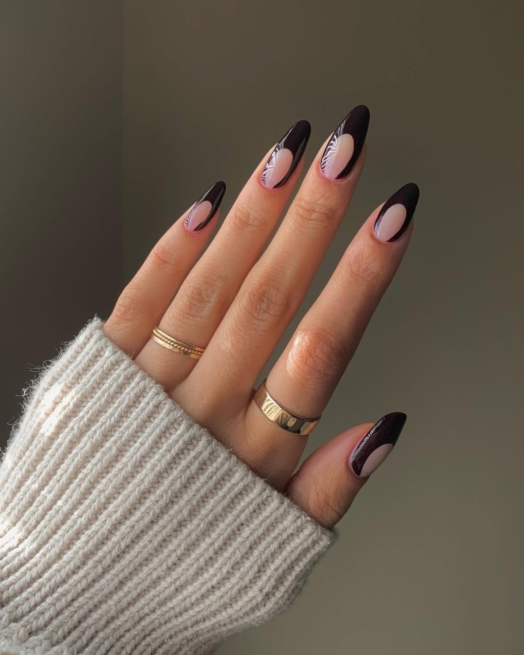 Negative space French tip nails in minimalist style