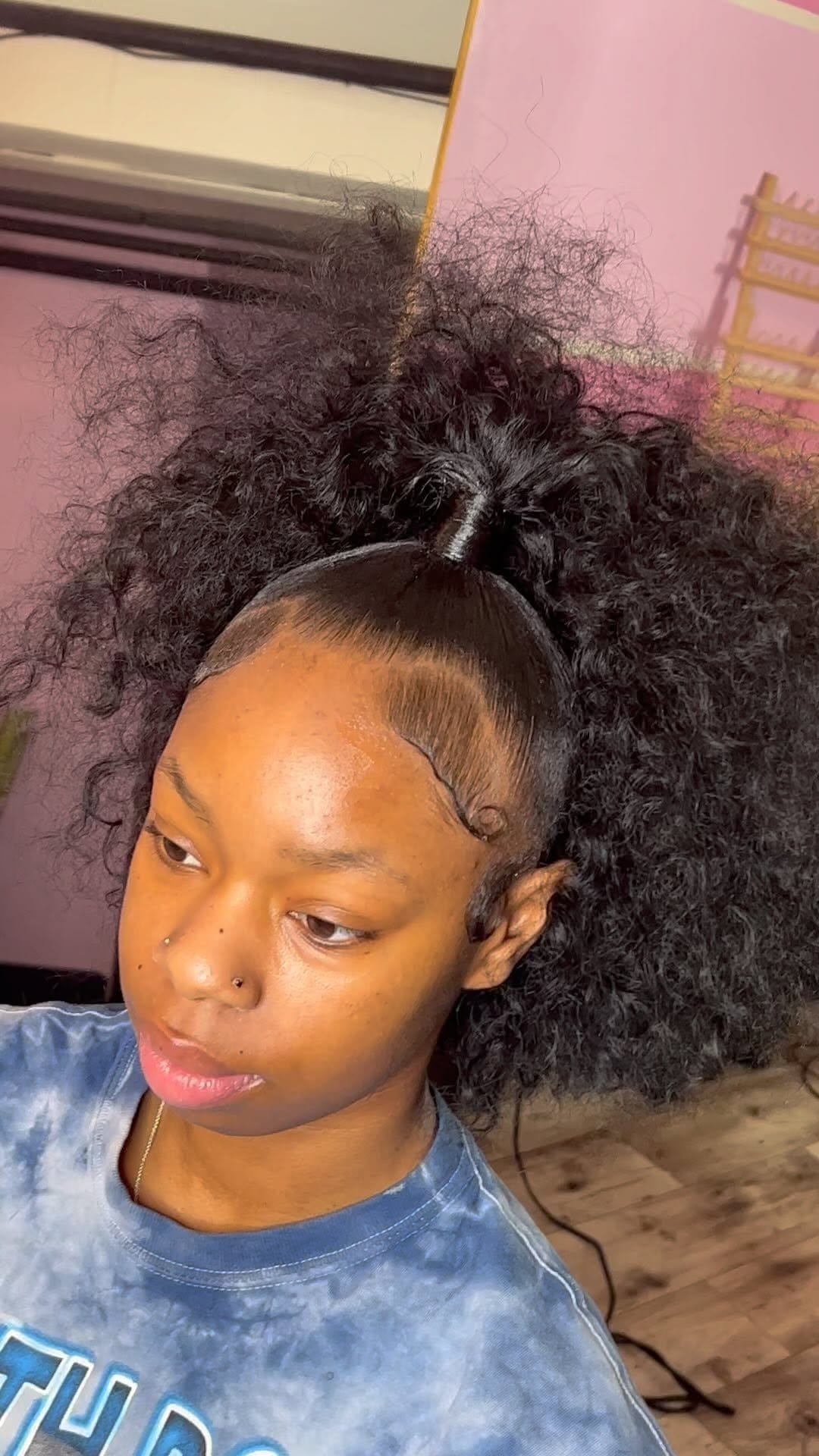 Voluminous curly ponytail with bounce