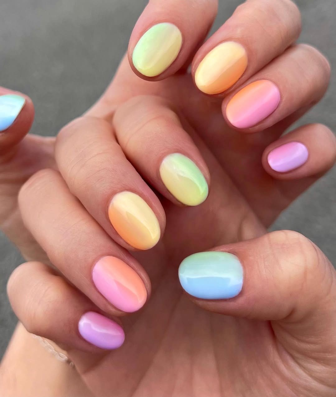 Vibrant rainbow ombre Easter nails