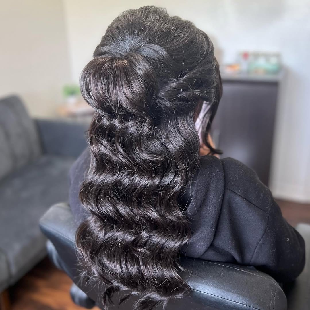 Half-up style with curls and bow