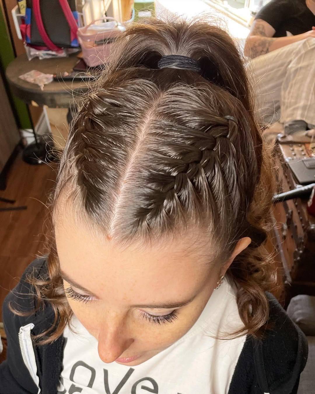 French braid leading into a ponytail