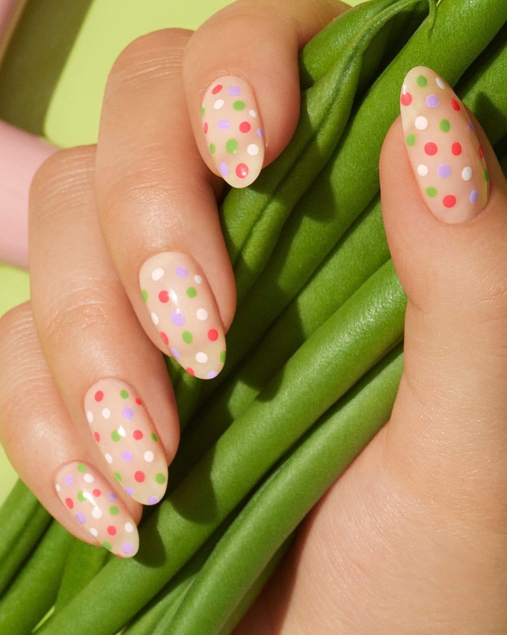 Colorful polka dot nails in spring hues