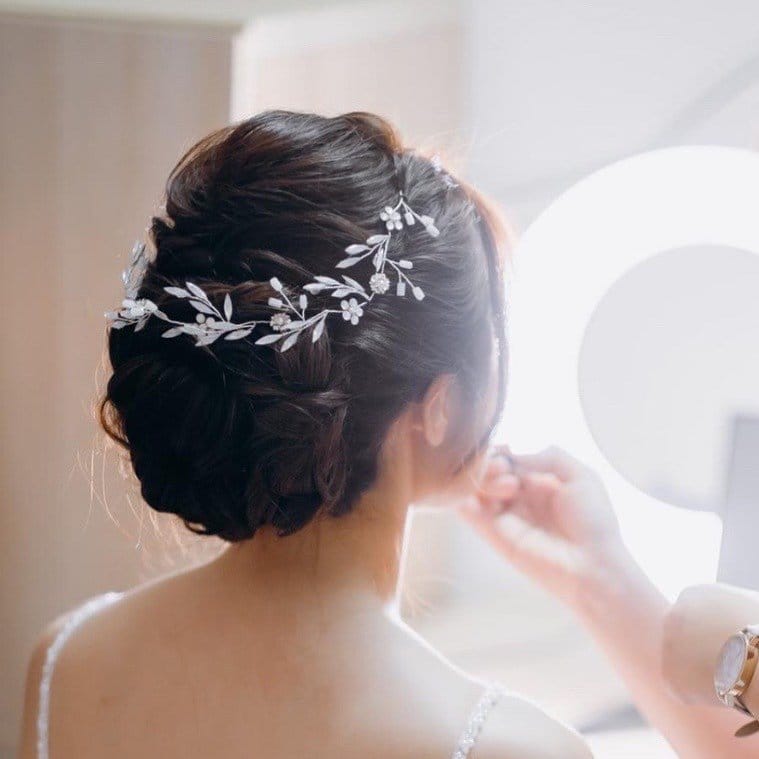 Low bun with sparkling rhinestone pins