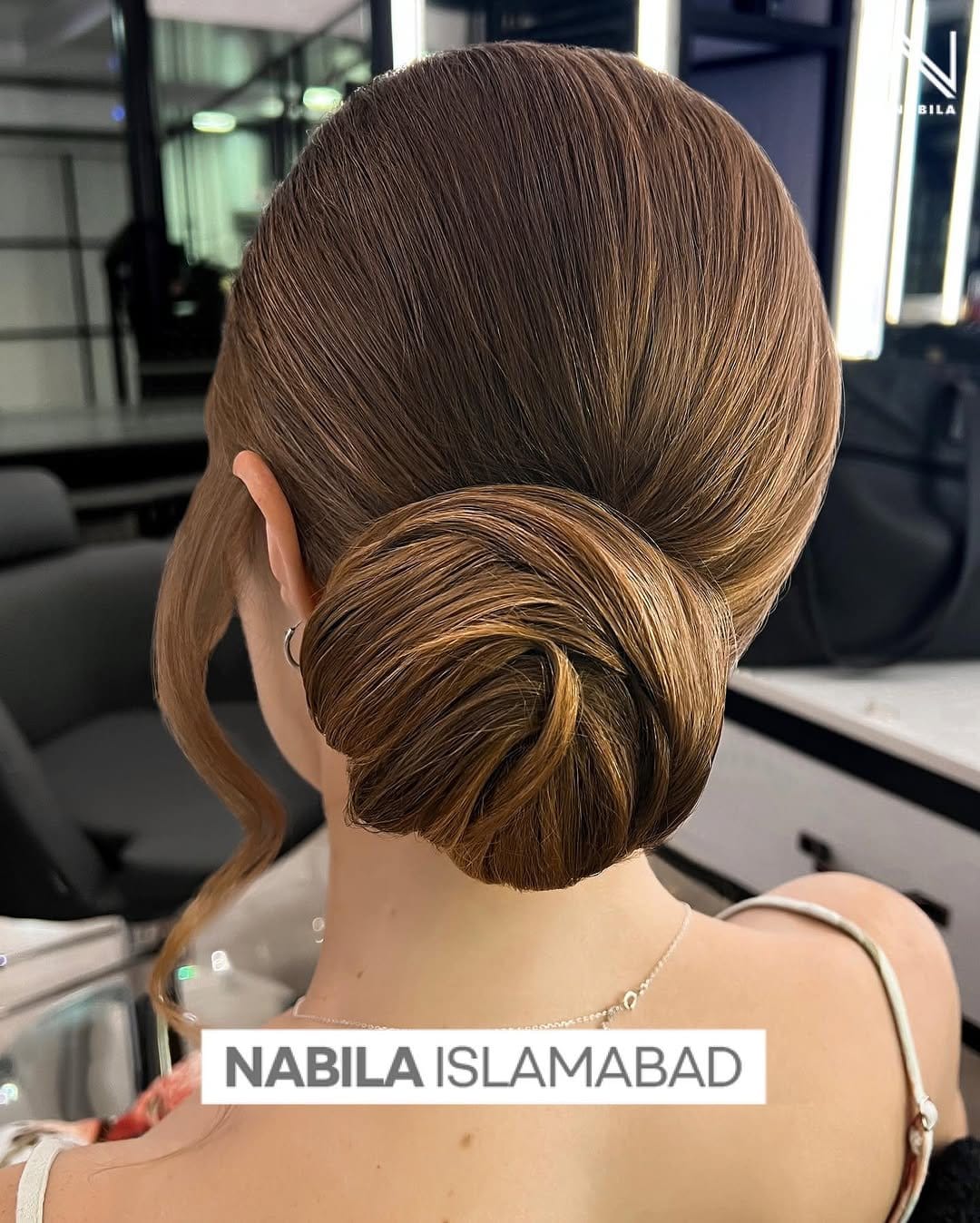 Chic braided chignon with sleek finish