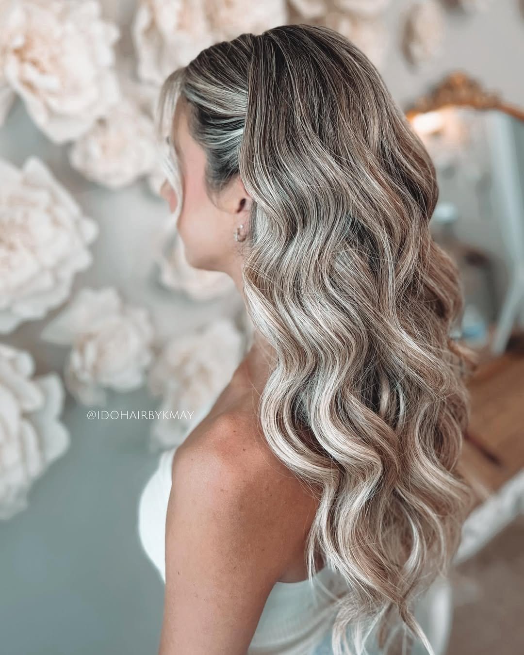 Glamorous side-swept DIY curls