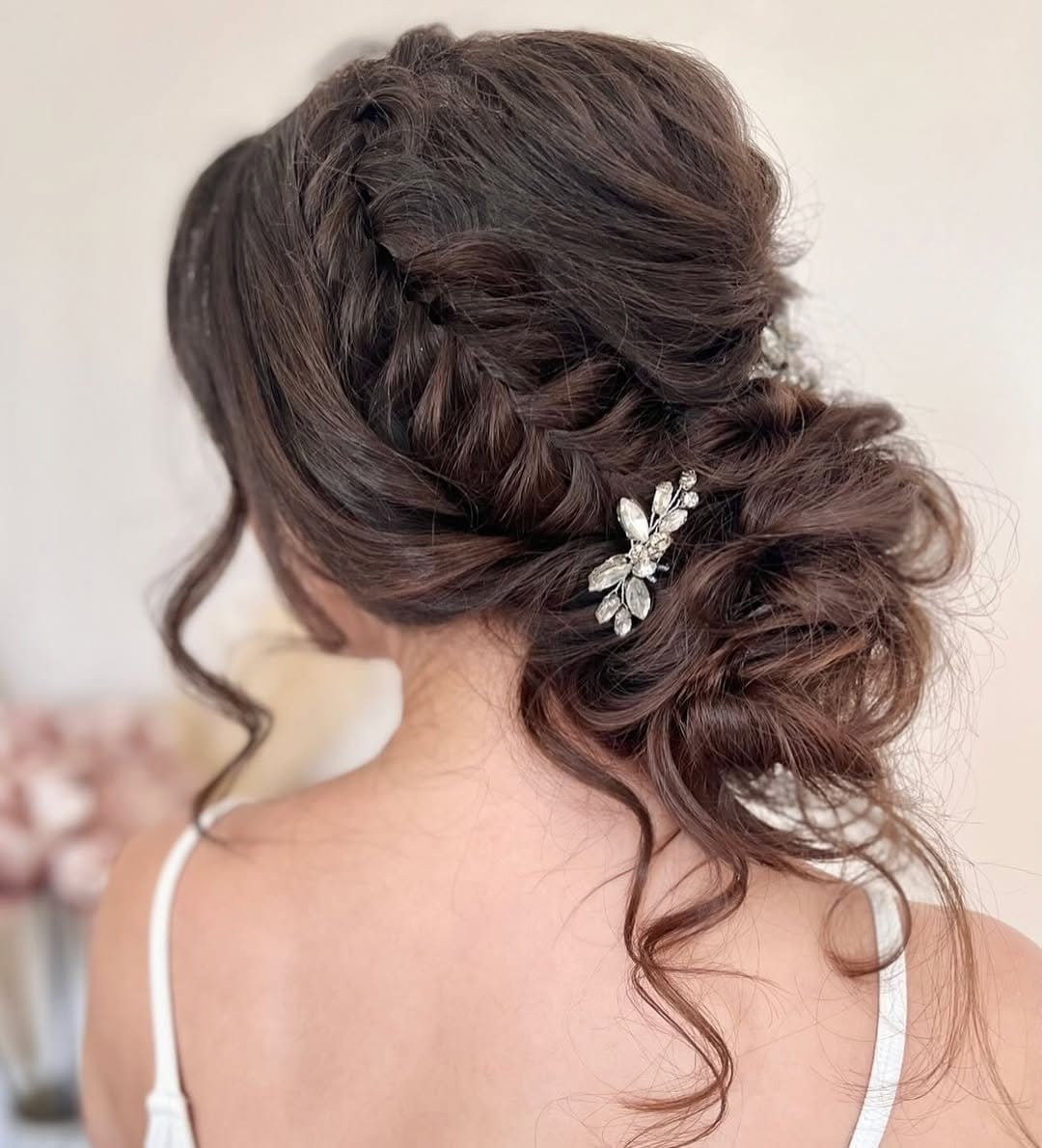 Textured braided updo with intricate details
