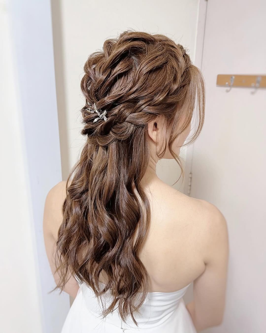 Twisted half-updo with romantic waves