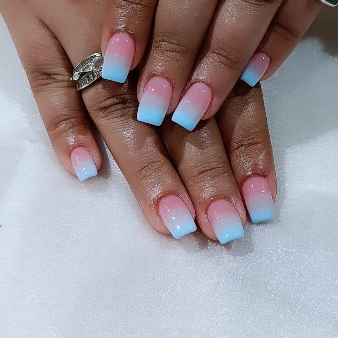 Sky blue pastel nails with ombré effect