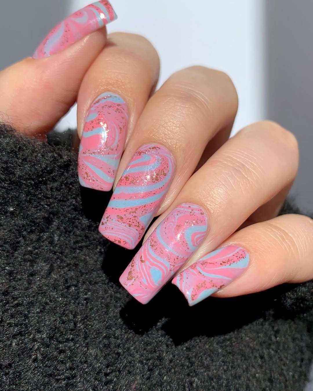Candyfloss pink pastel nails with swirl patterns