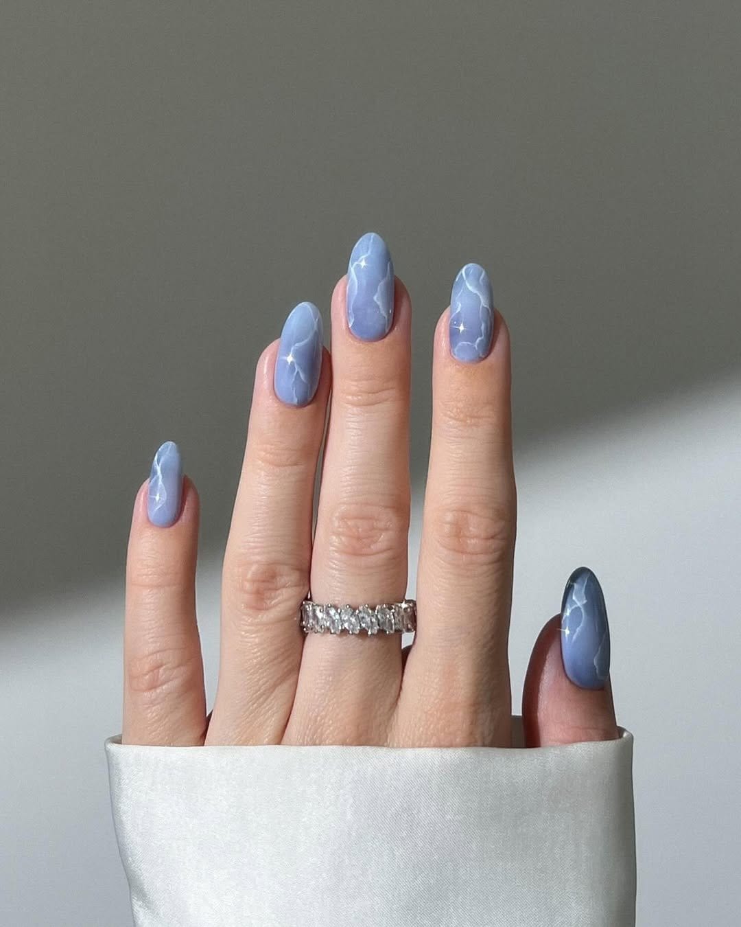 Lavender pastel nails with butterfly decals