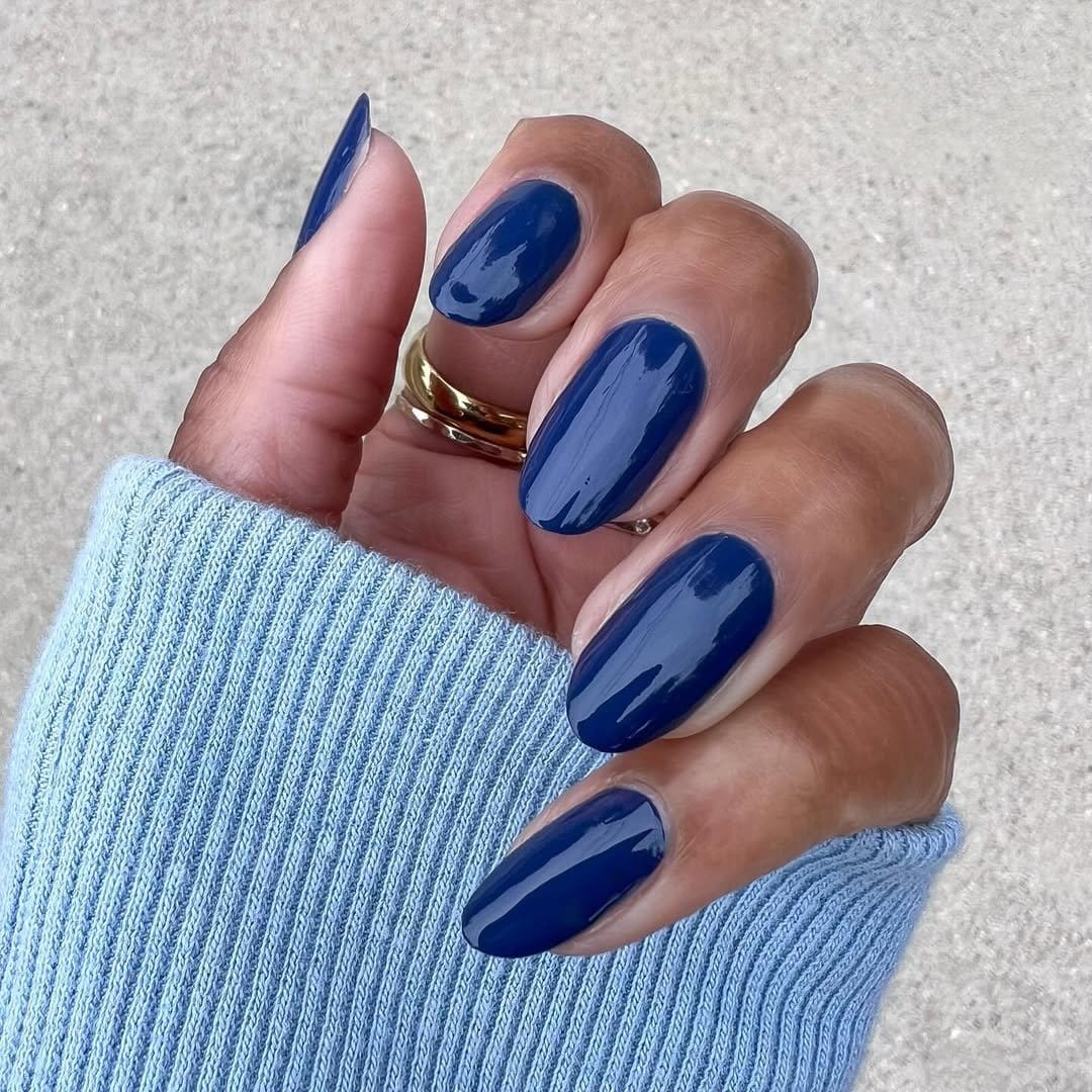 Navy and white sailor-inspired nails