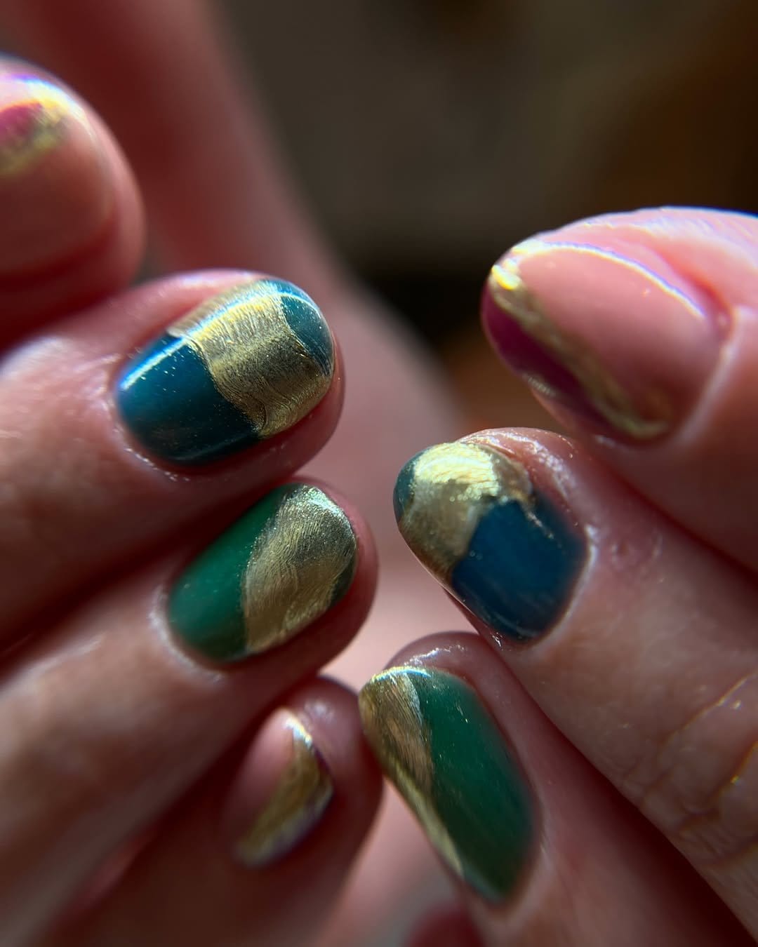 Rich jewel-toned nail art