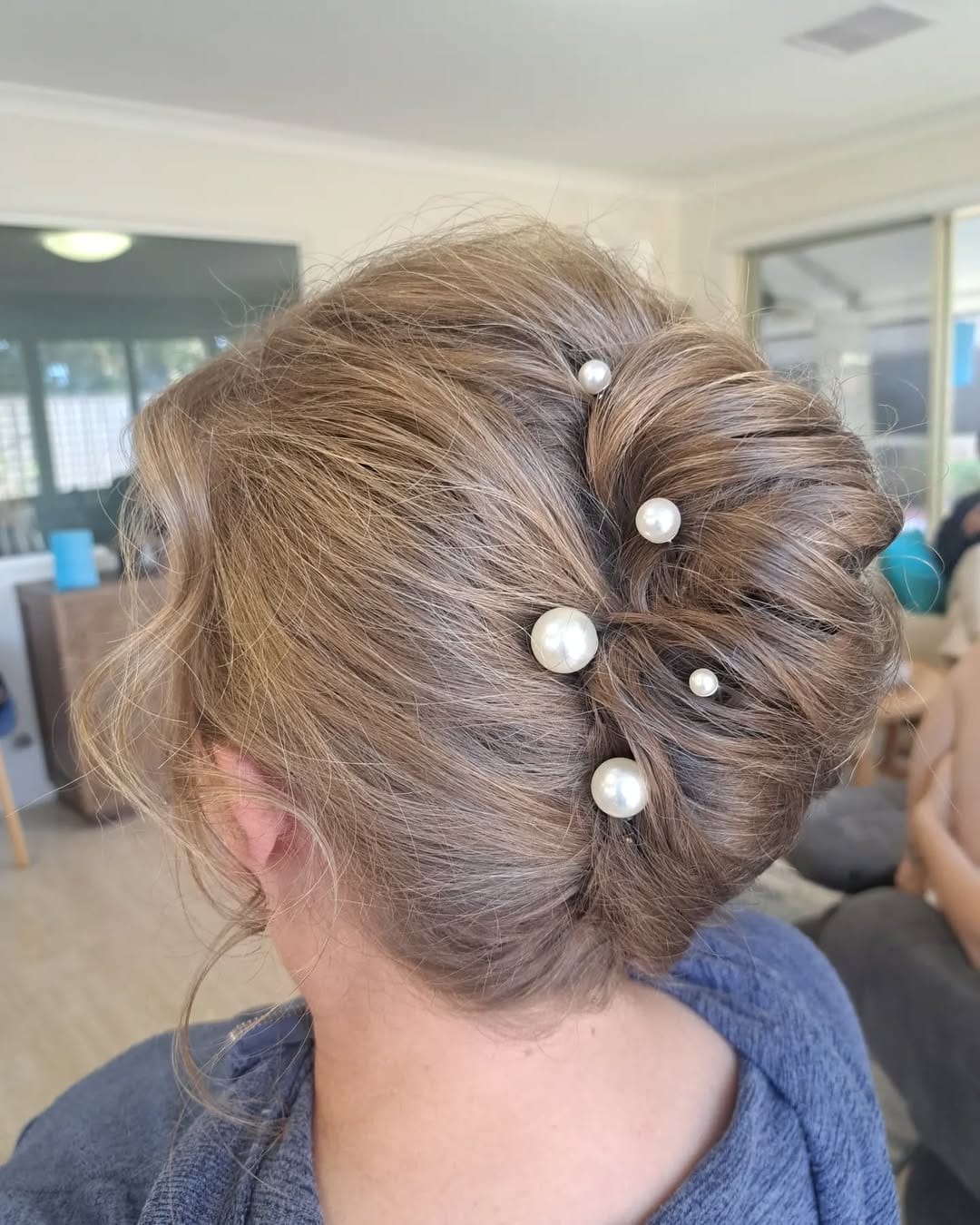 Low bun with pearl details
