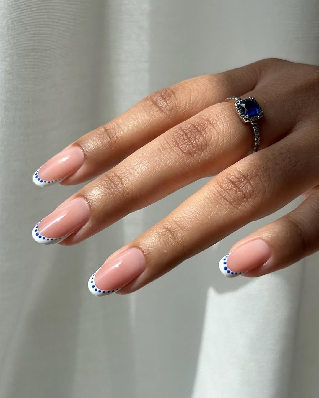 Creative dotted French manicure