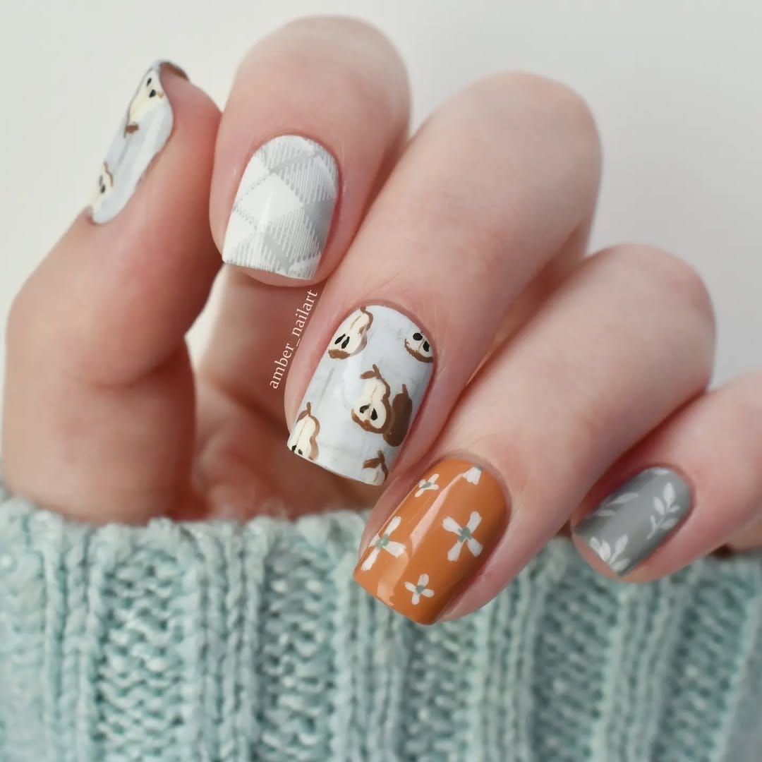 Colorful fruit-themed nail stickers on a white base