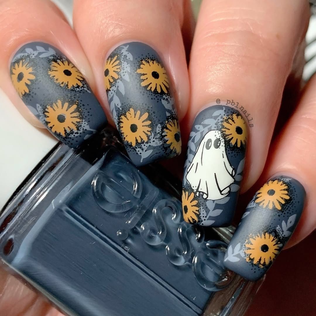Abstract sunflower splash nail art with vibrant colors