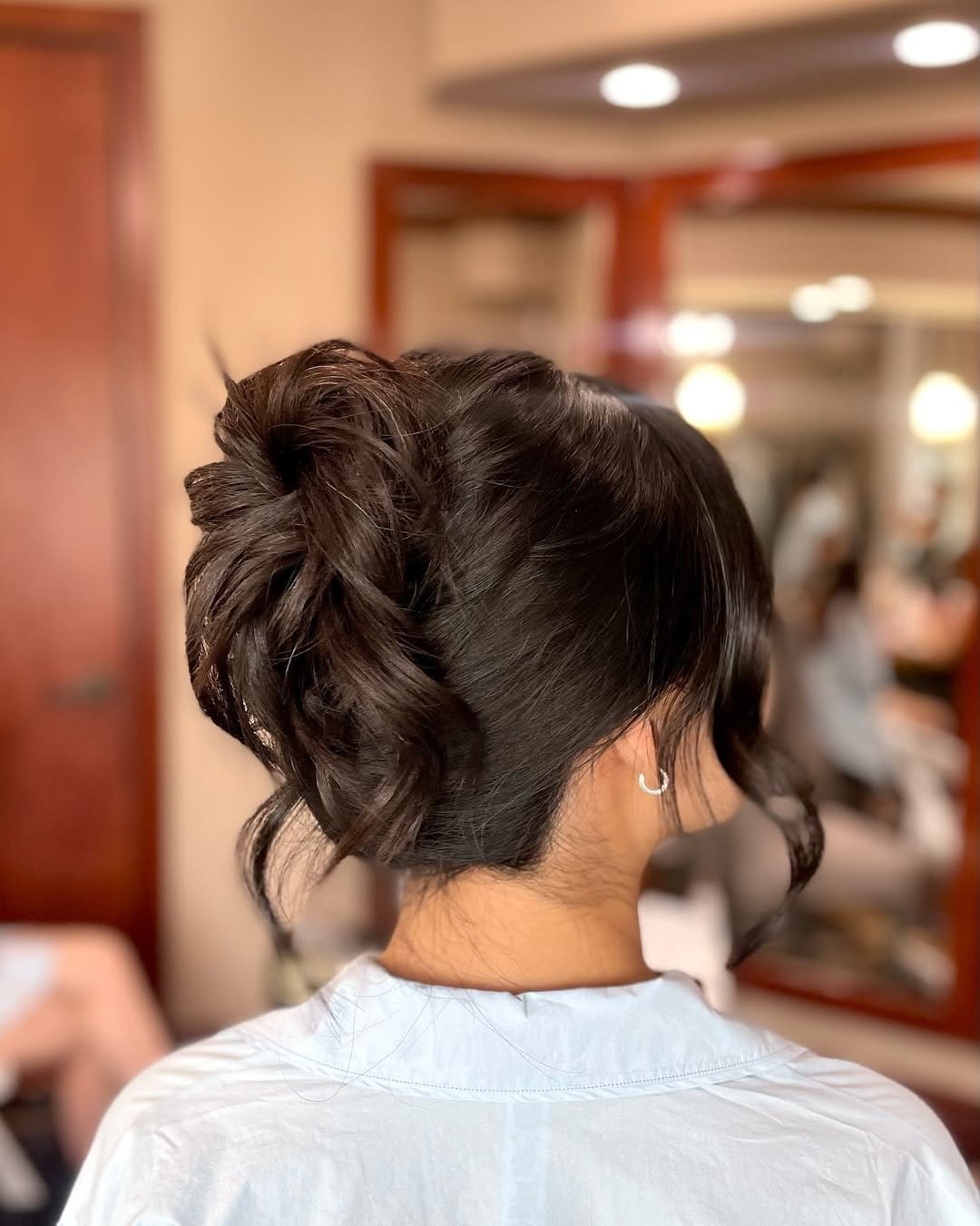 Twisted updo with jeweled pins
