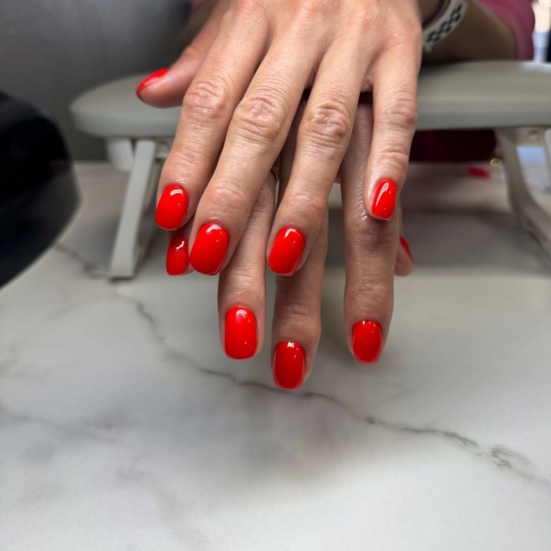 Bold fiery red nails