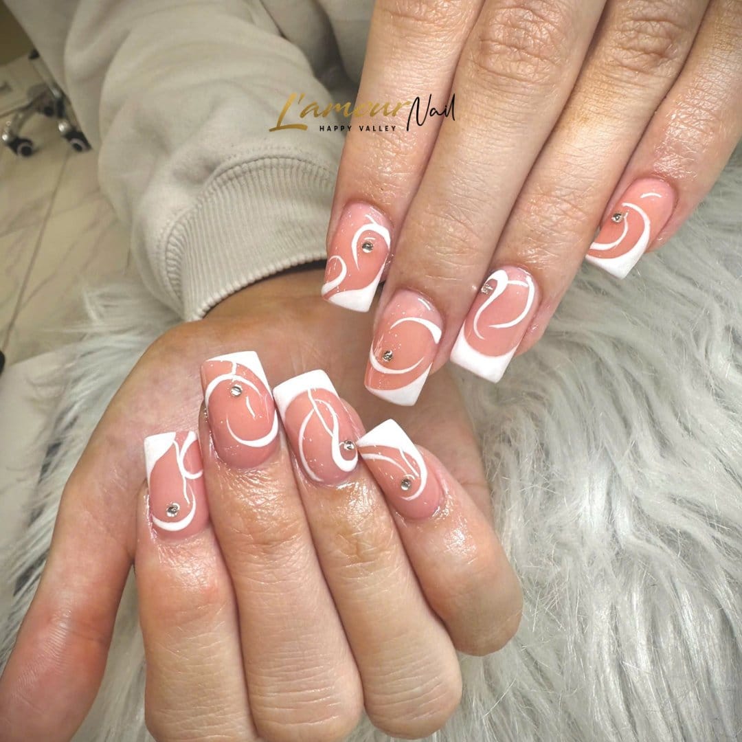 French tip nails with twisted design