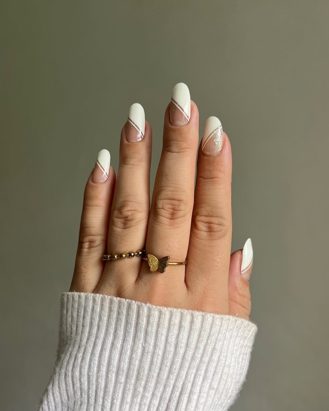 Geometric pastel nail art on white base