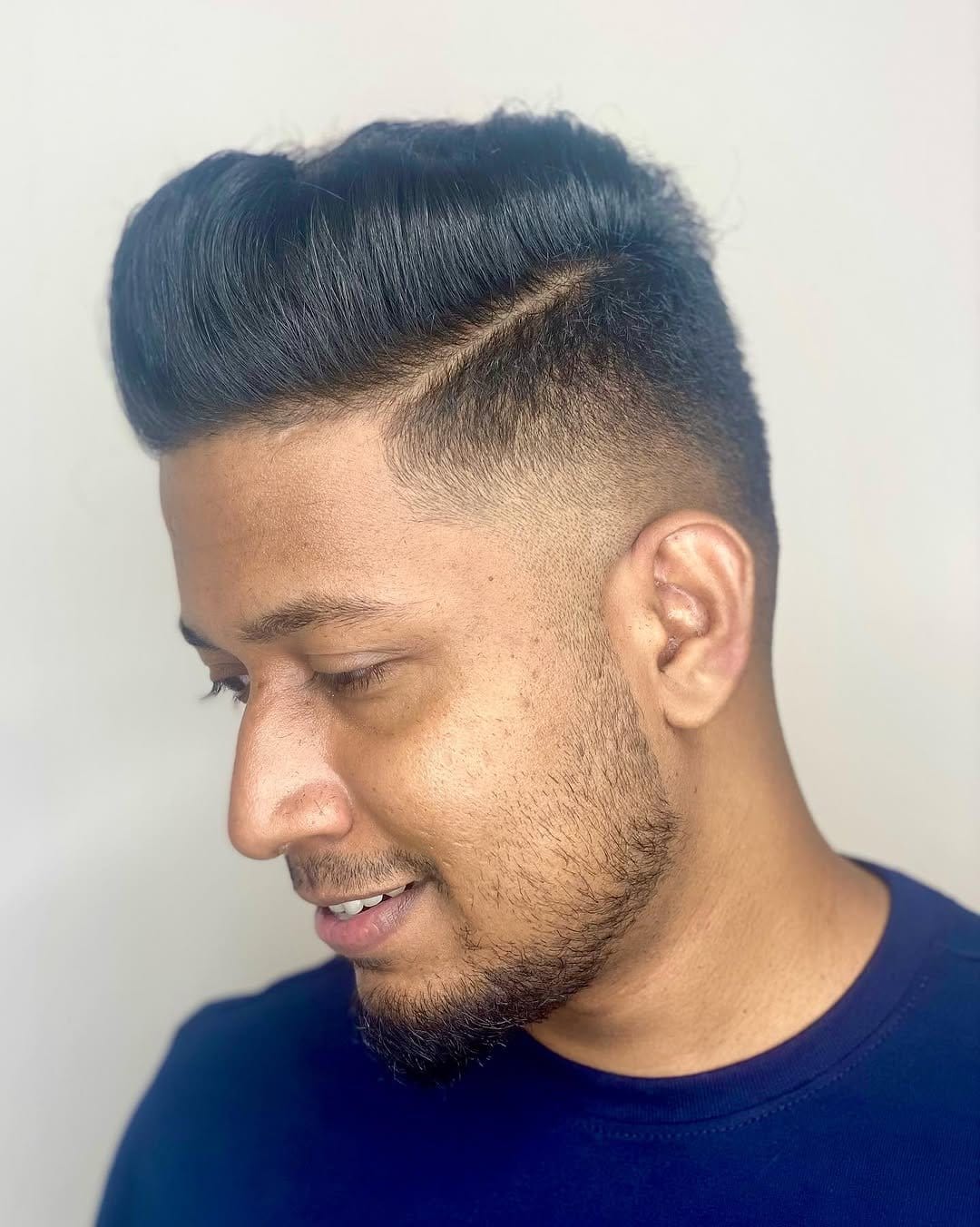 Modern pompadour with braided sides