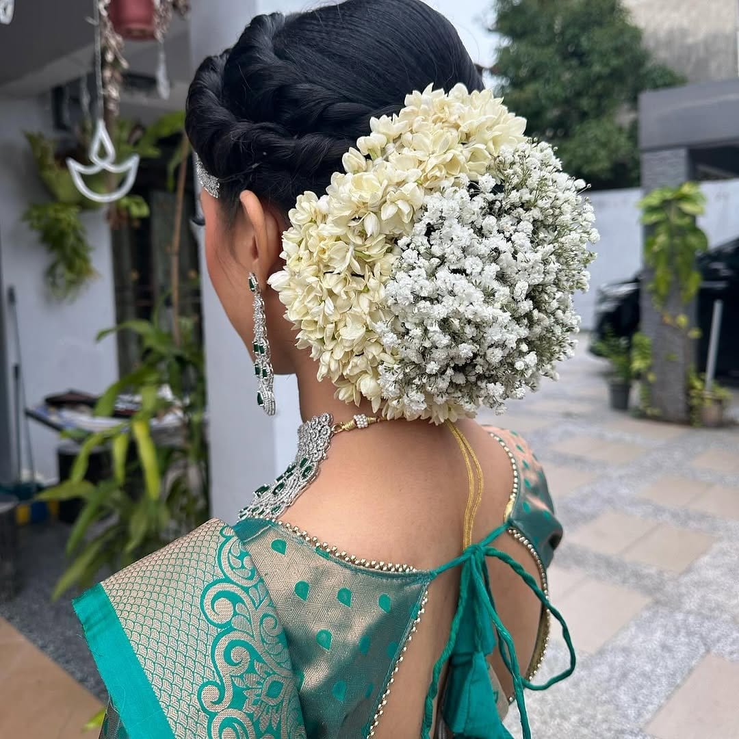 Braided bun with delicate flower accents