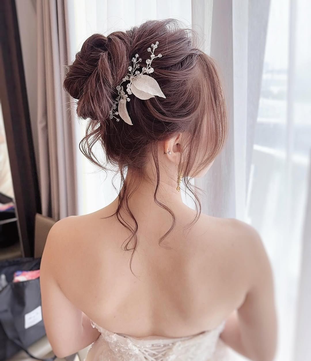 Classic chignon with lace ribbon