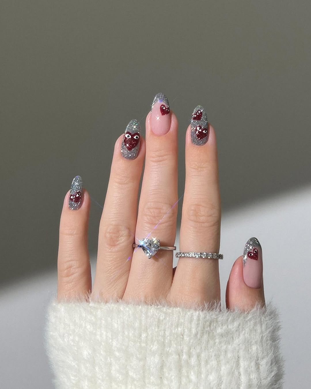 Baby pink pastel nails with heart decals