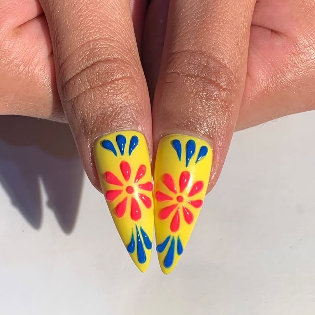 Plaid pattern nail art with sunflower designs
