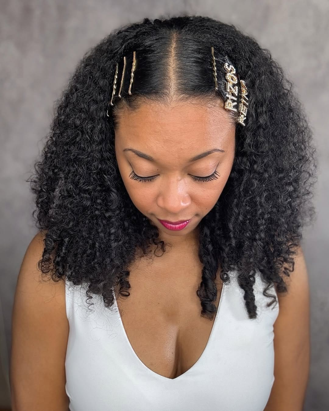 Braided faux hawk with cascading curls