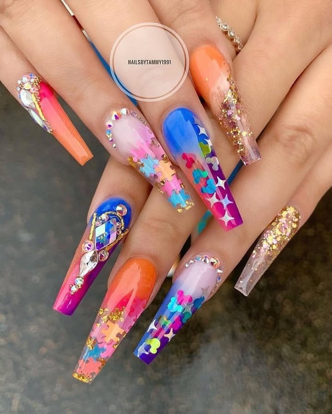 Colorful puzzle piece nail design
