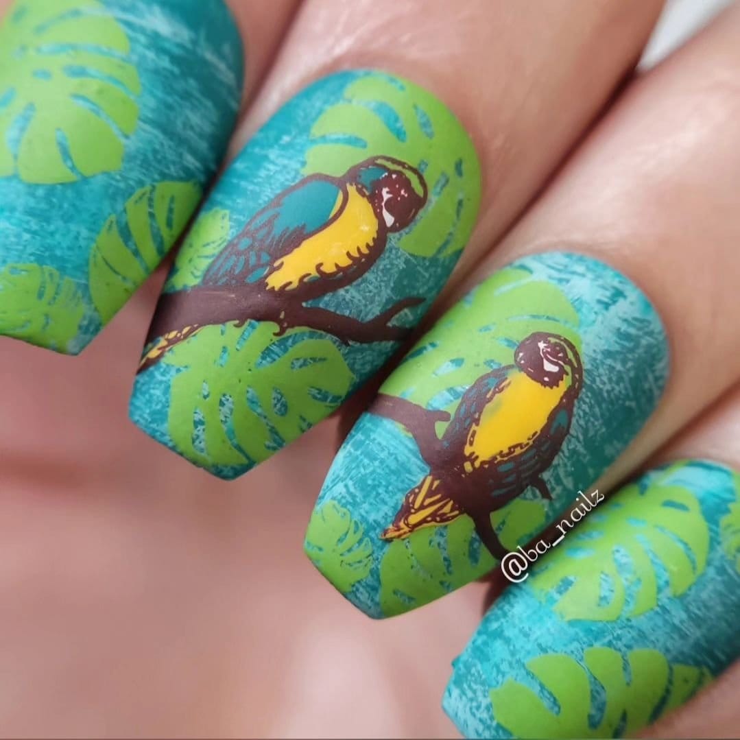 Bird-inspired nail art with pastel colors