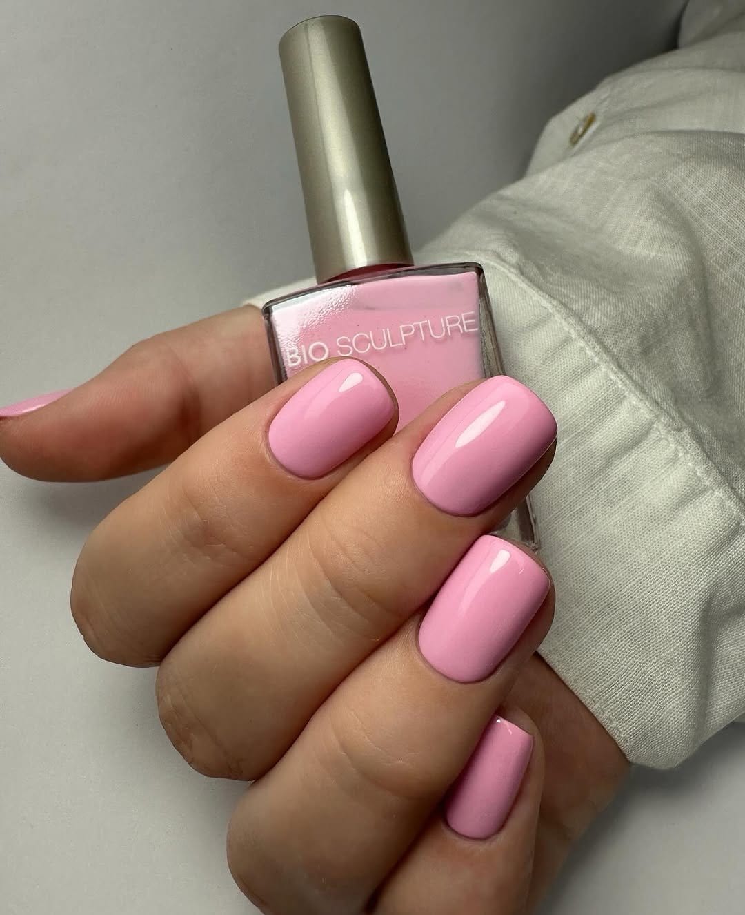 Powder pink pastel nails with silver stripes