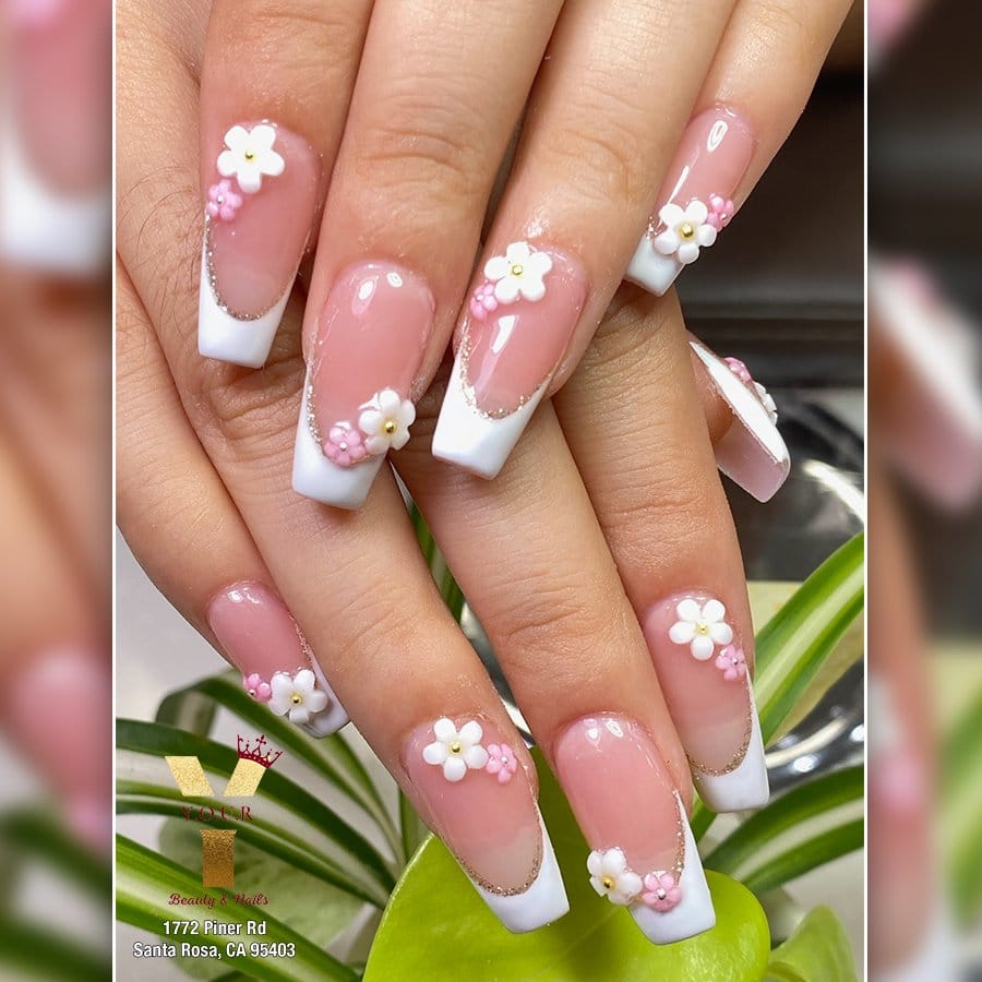Pink petal nail art with tiny rhinestones