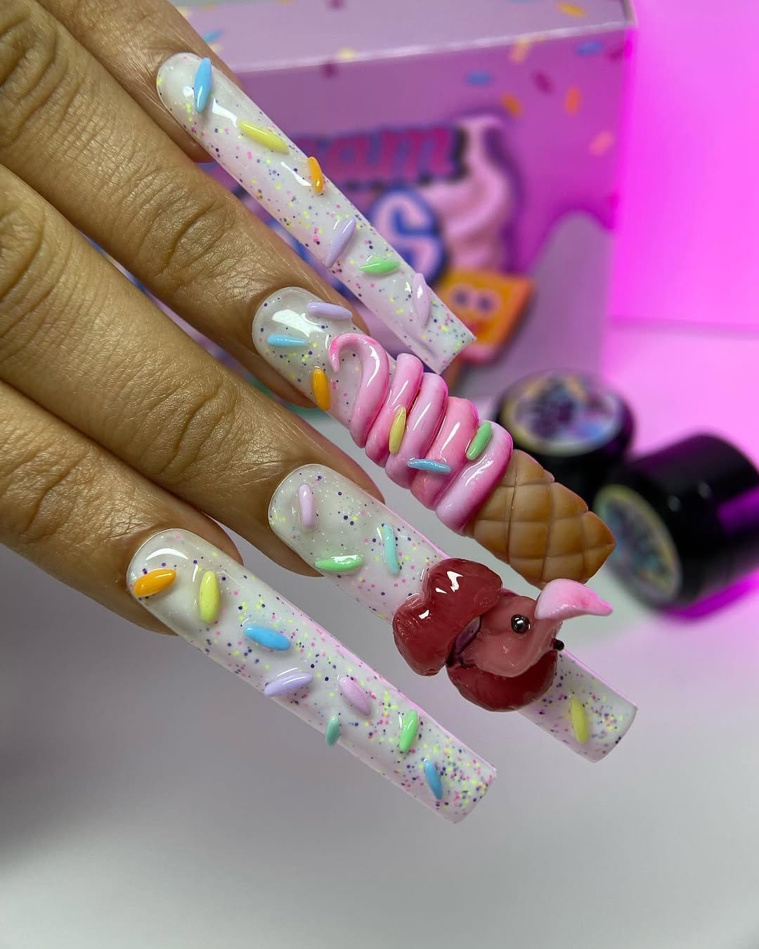 Bubblegum pink pastel nails with candy designs