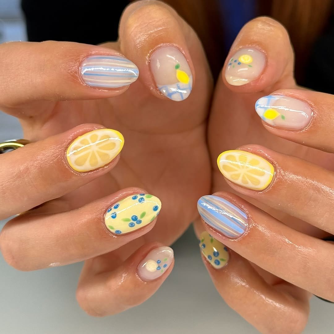 Striped lemon yellow and white nails