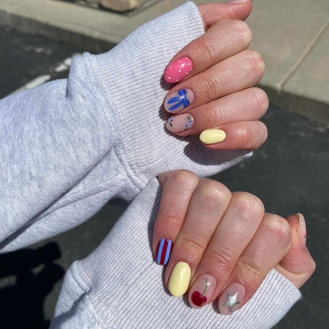 Yellow nails with anchor and stripes