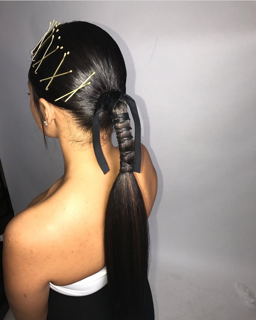 Stylish braided low ponytail with sleek lines