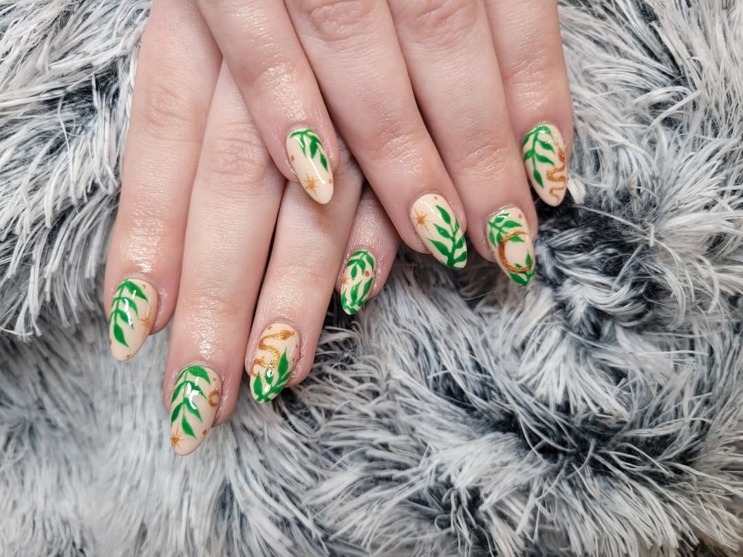Fern-inspired nail art with green hues