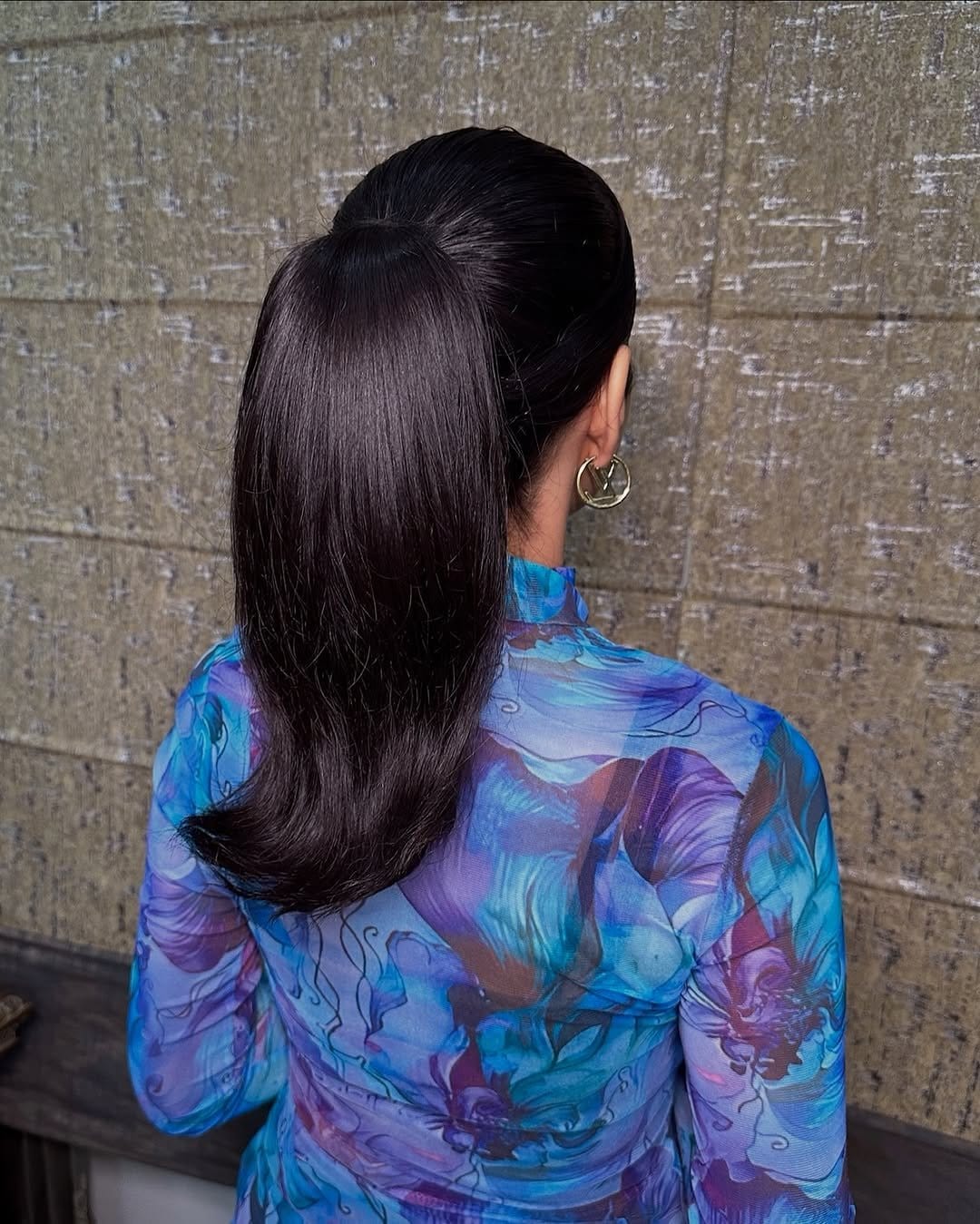 Side-swept curls with polished finish