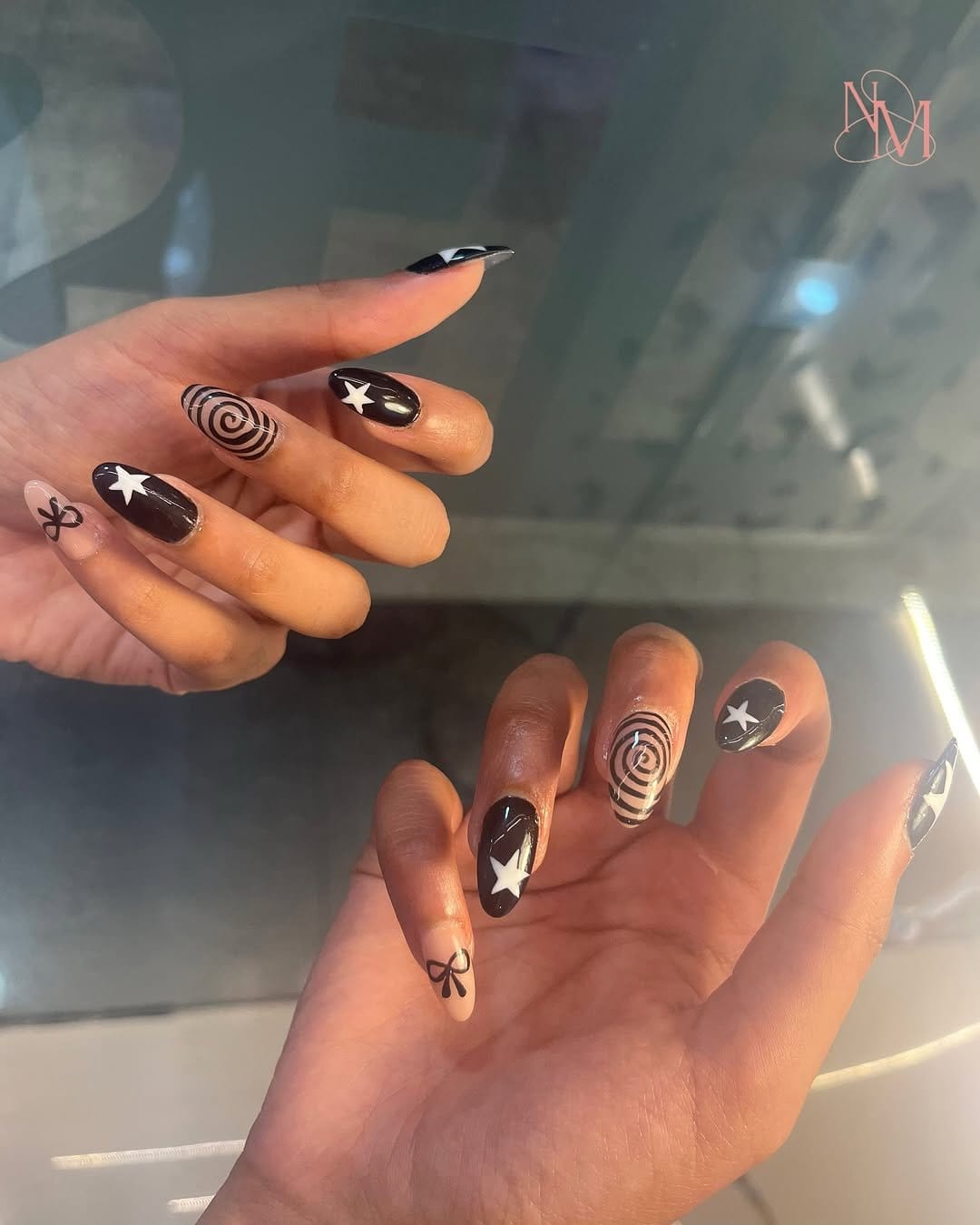 Graphic black and white nail art