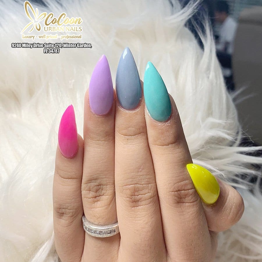 Geometric pattern nail art with sunflower elements
