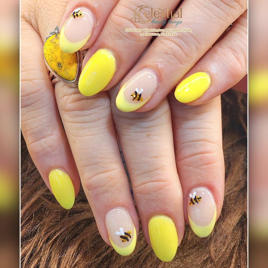 Yellow nails with honeycomb design