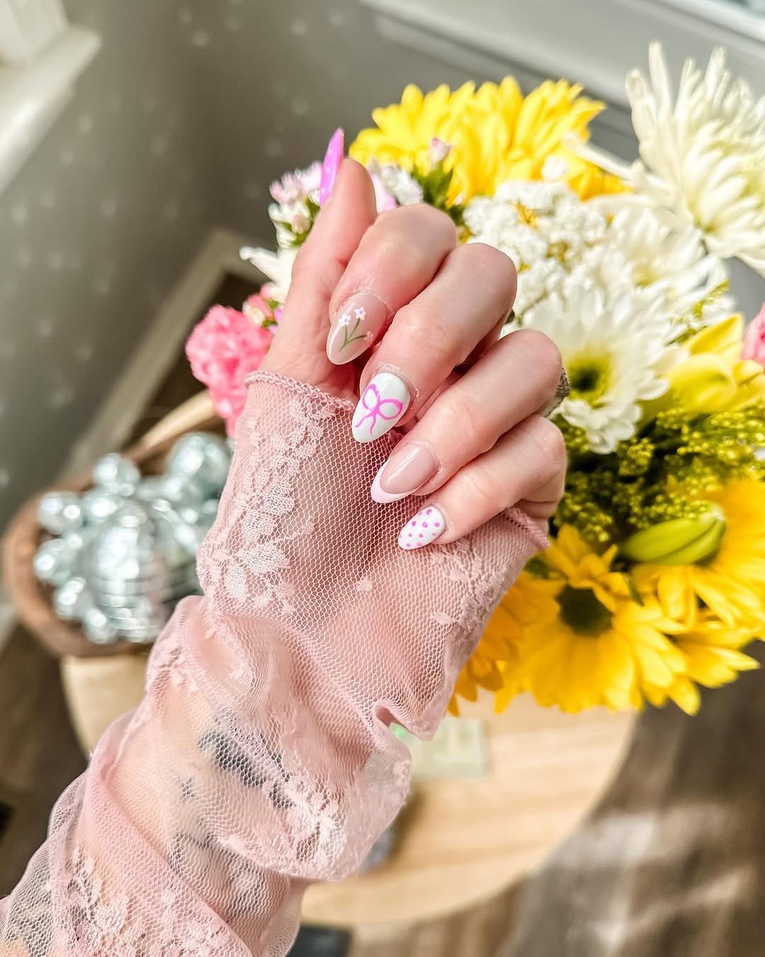 Lace overlay with sunflower design on nails