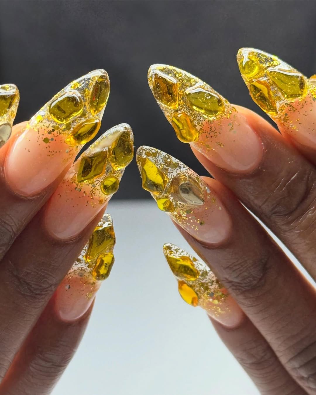 Glittery silver and lemon yellow nails