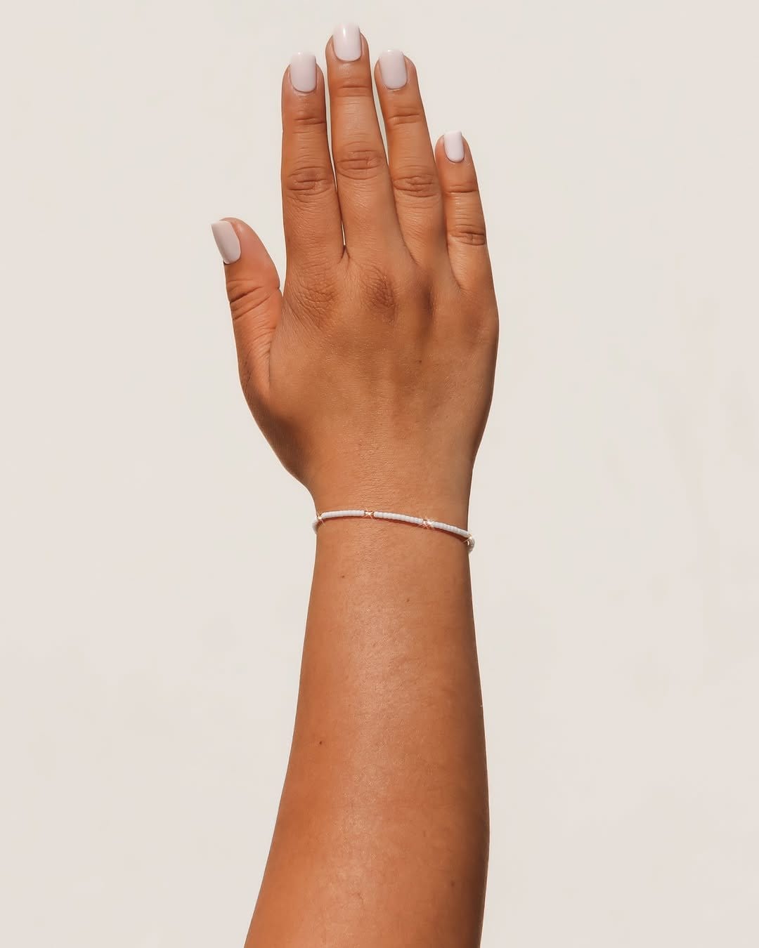 Seafoam green pastel nails with shell accents